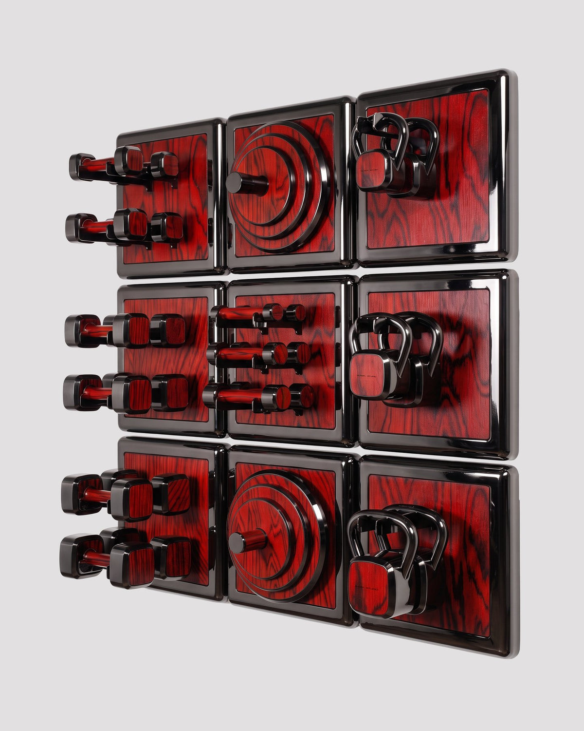 ALAMA twelve-module wall configuration example in ALPI Sottsass Red and black metal, with illustrative equipment. Standard offer: nine modules.