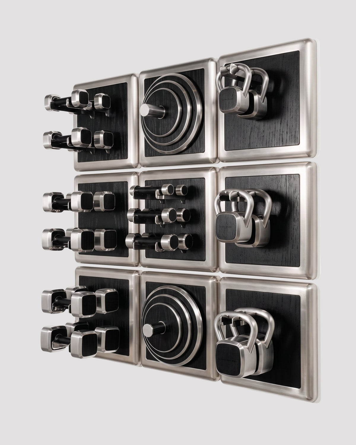 ALAMA twelve-module wall configuration example in ALPI Planked Black and satin steel, with illustrative equipment. Standard offer: nine modules.