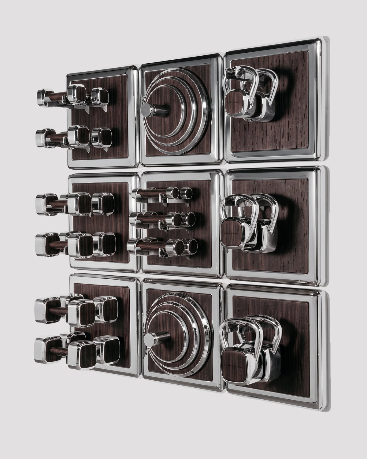 ALAMA twelve-module wall configuration example in ALPI Flamed Kakao and mirror-polished steel, with illustrative equipment. Standard offer: nine modules.