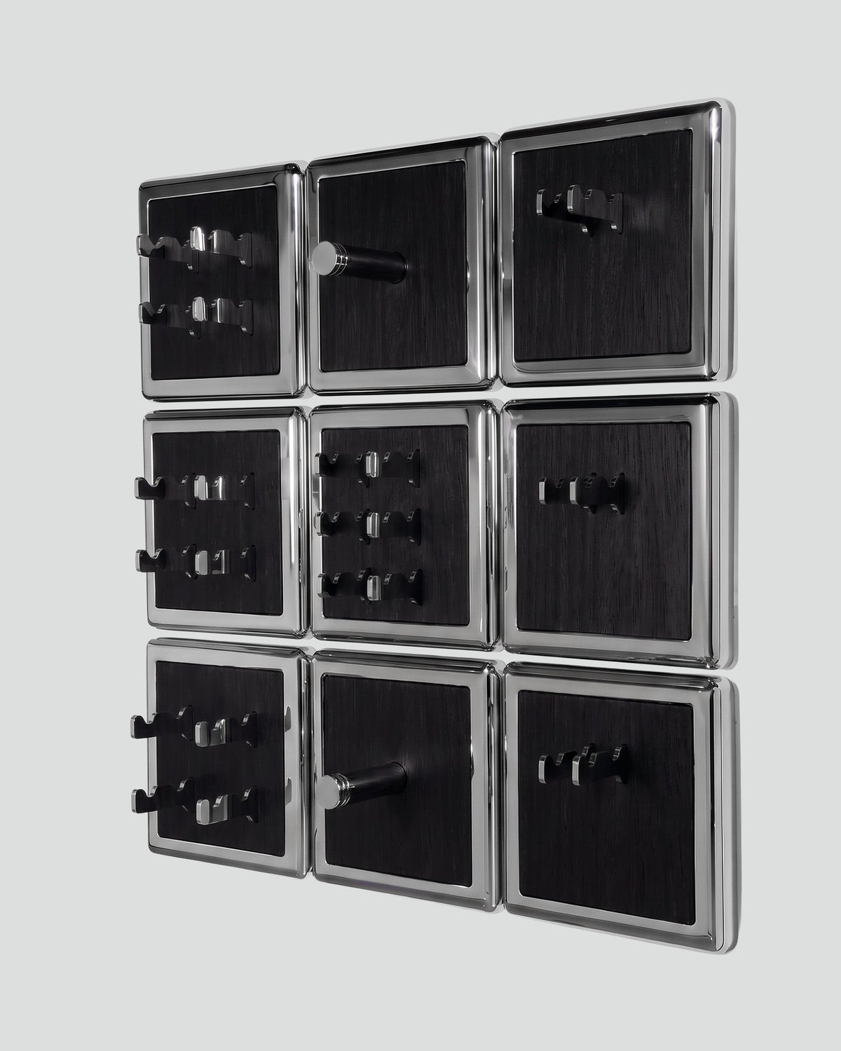 ALAMA twelve-module wall configuration example in ALPI Planked Black and mirror-polished steel, storage-only view. Standard offer: nine modules.