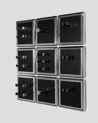 ALAMA twelve-module wall configuration example in ALPI Planked Black and mirror-polished steel, storage-only view. Standard offer: nine modules.