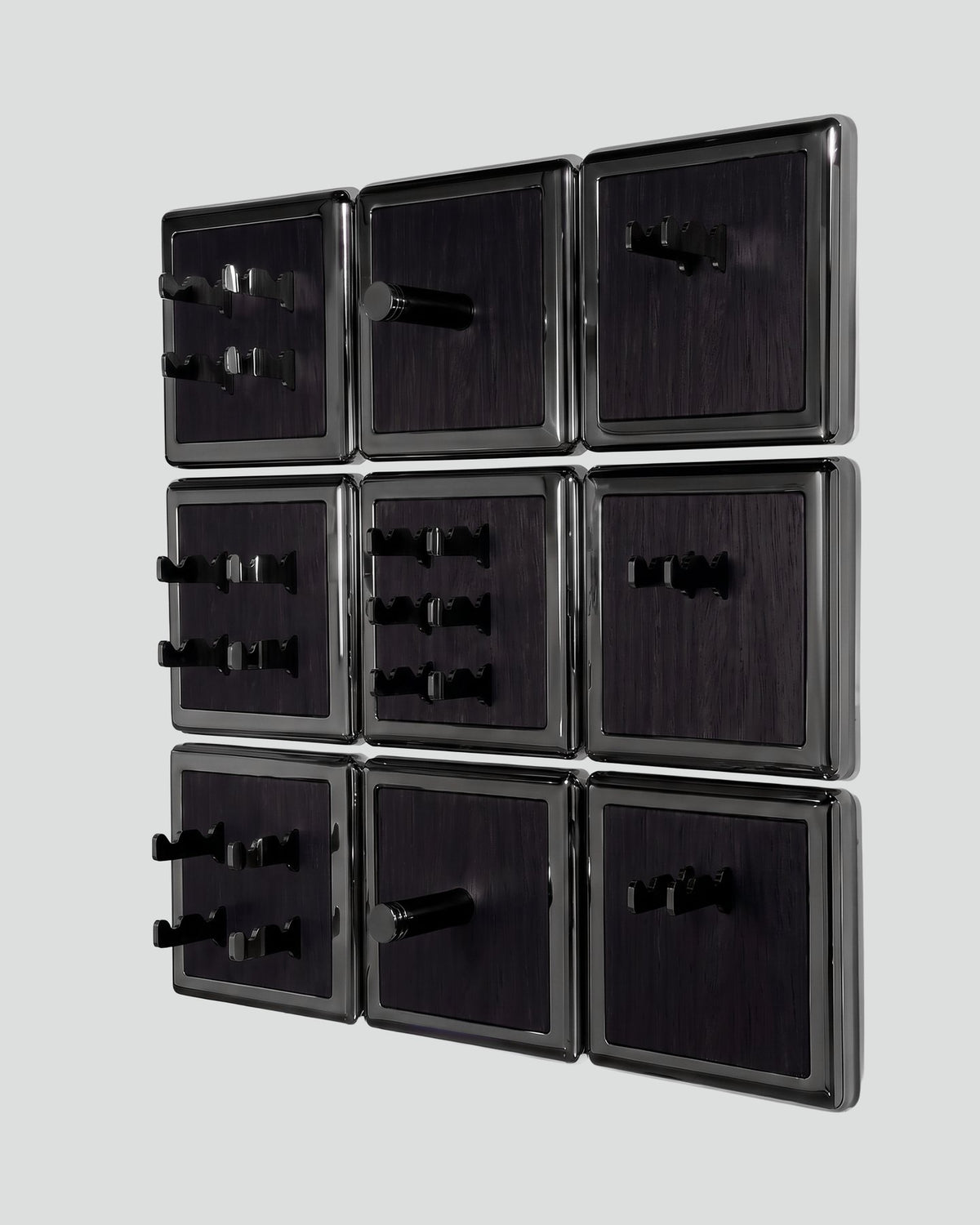 ALAMA twelve-module wall configuration example in ALPI Planked Black and black metal, storage-only view. Standard offer: nine modules.