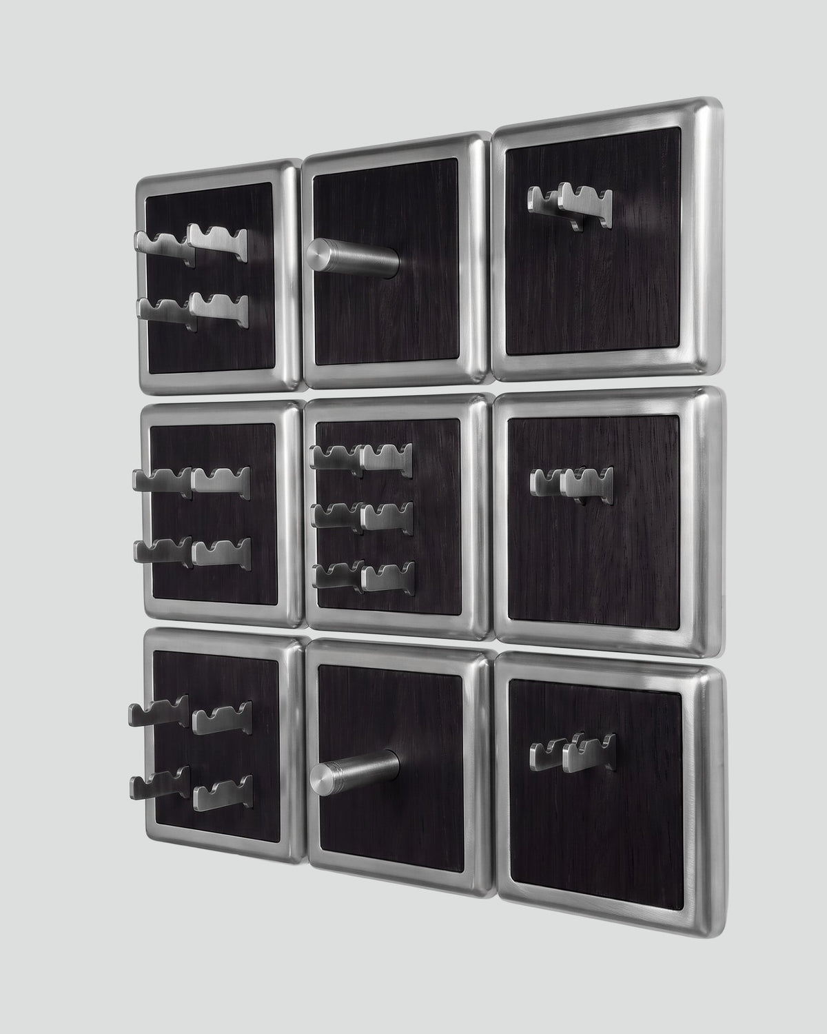 ALAMA twelve-module wall configuration example in ALPI Planked Black and satin steel, storage-only view. Standard offer: nine modules.
