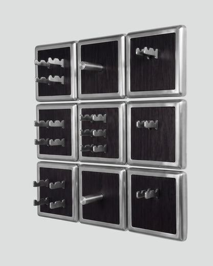 ALAMA twelve-module wall configuration example in ALPI Planked Black and satin steel, storage-only view. Standard offer: nine modules.