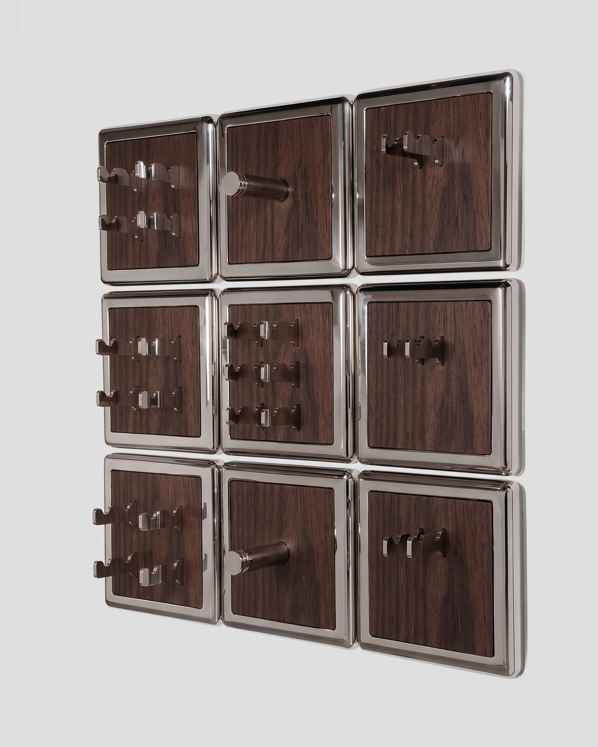 ALAMA twelve-module wall configuration example in ALPI Flamed Kakao and mirror-polished steel, storage-only view. Standard offer: nine modules.