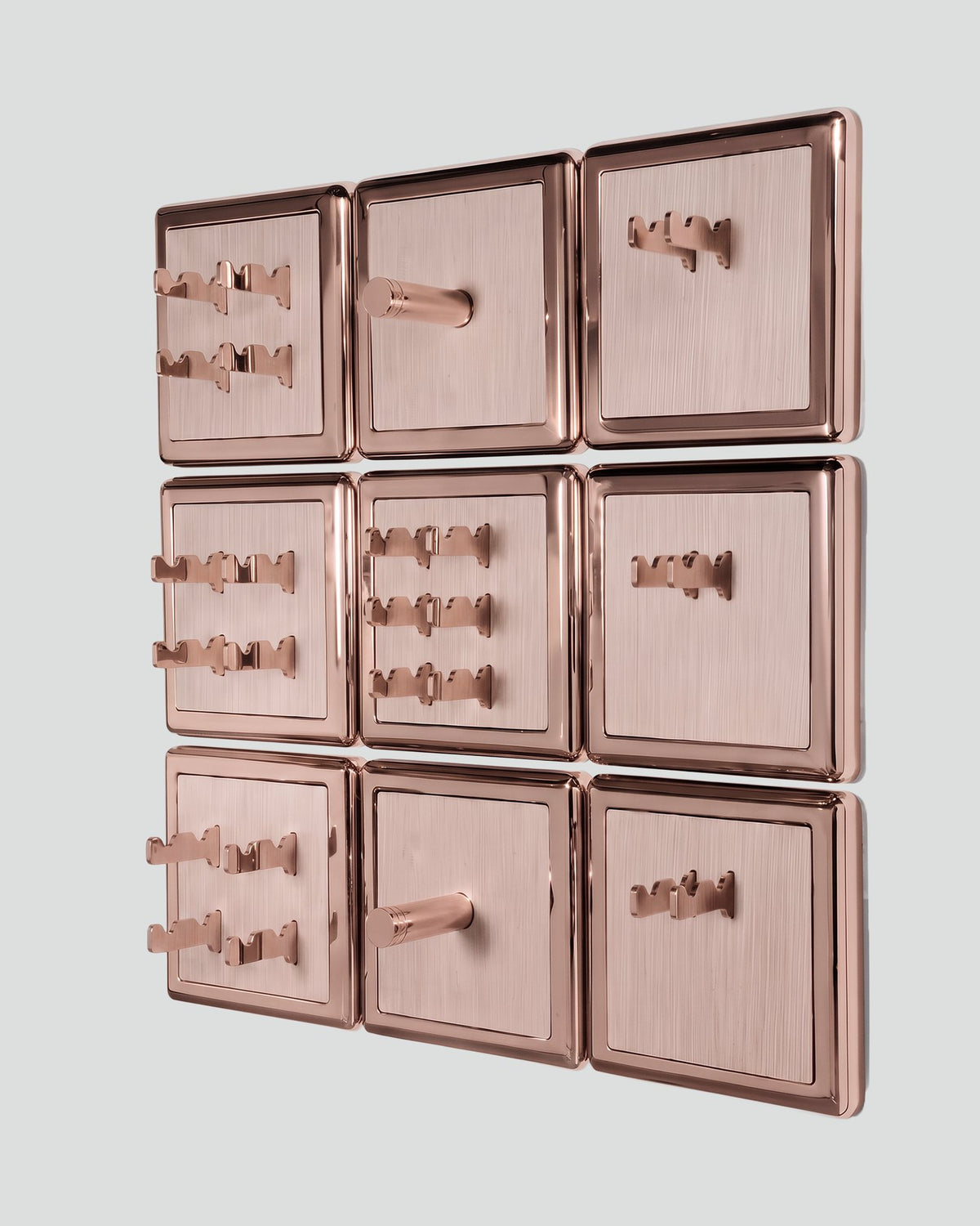 ALAMA twelve-module wall configuration example in ALPI Striped White and rose gold metal, storage-only view. Standard offer: nine modules.