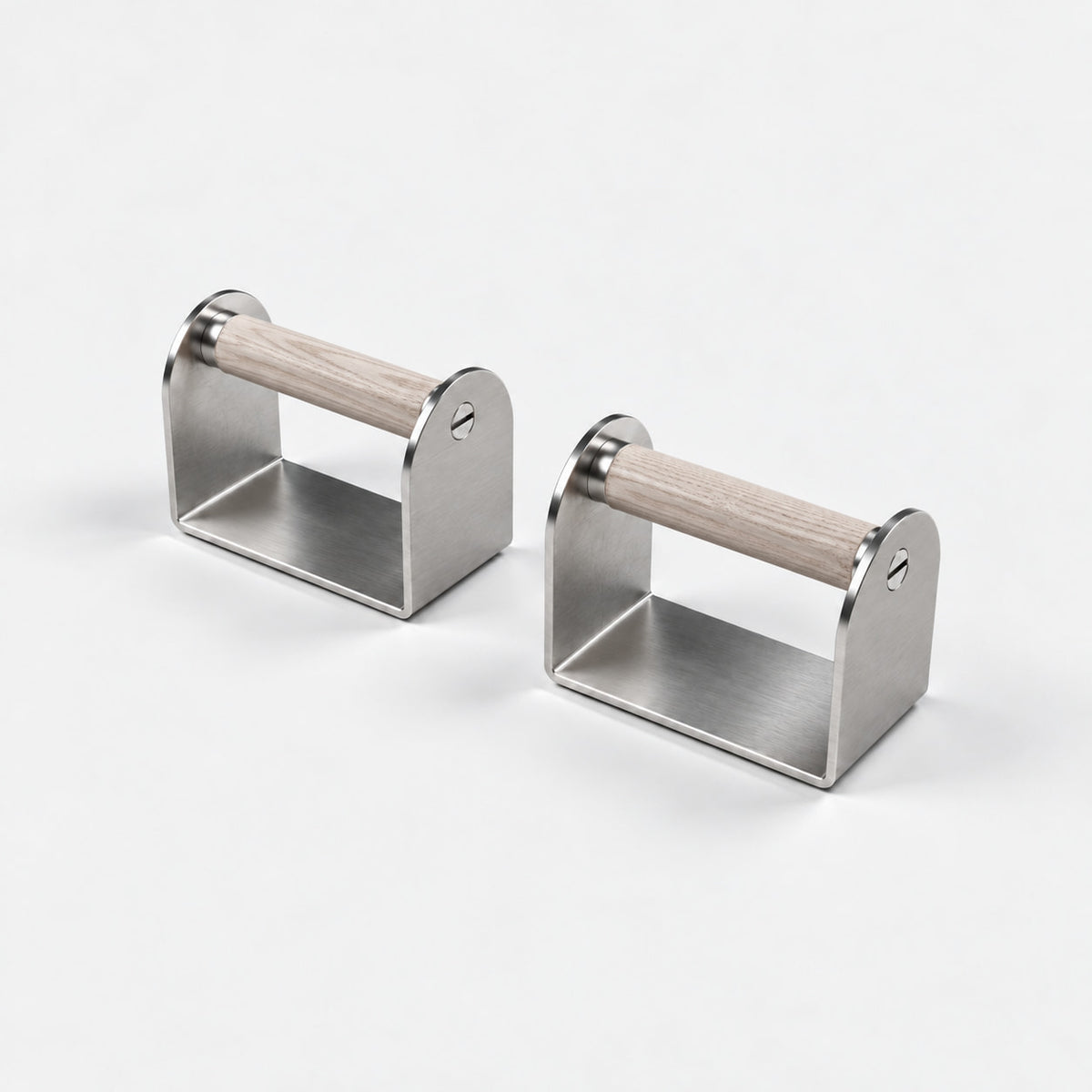 Dann Pushup Bars — angled view; Grey Ash wood grips and natural stainless steel. FYSIK studio finish study — October 2026. Representative configuration.