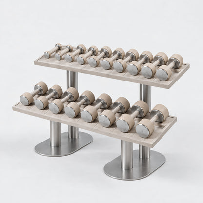 Fysik Horizontal 2 Tier Dumbbell Rack — angled view; Grey Ash wood, beige leather and natural stainless steel where applicable. FYSIK studio finish study — October 2026. Representative configuration.