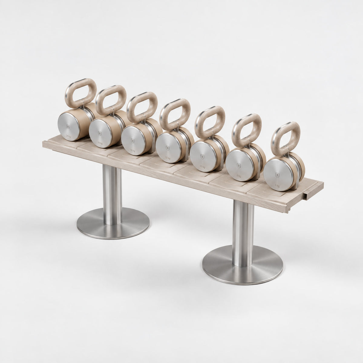 Fysik Horizontal Kettlebell Rack — angled view; Grey Ash wood, beige leather and natural stainless steel where applicable. FYSIK studio finish study — October 2026. Representative configuration.