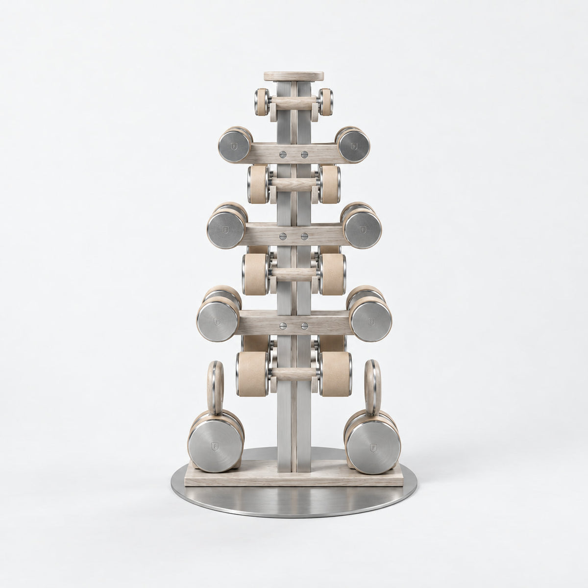 Fysik Vertical Combo Tower — front view; Grey Ash wood, beige leather and natural stainless steel where applicable. FYSIK studio finish study — October 2026. Representative configuration.