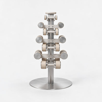 Fysik Vertical Dumbbell Tower — front view; Grey Ash wood, beige leather and natural stainless steel where applicable. FYSIK studio finish study — October 2026. Representative configuration.