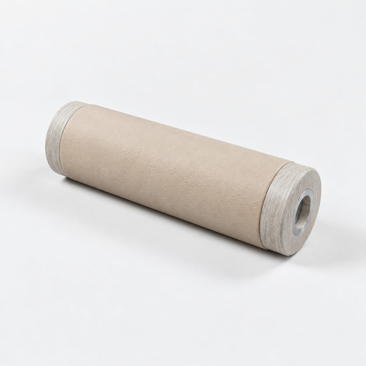 Gling Muscle Roller — angled view; Grey Ash wood, beige leather and natural stainless steel where applicable. FYSIK studio finish study — October 2026. Representative configuration.