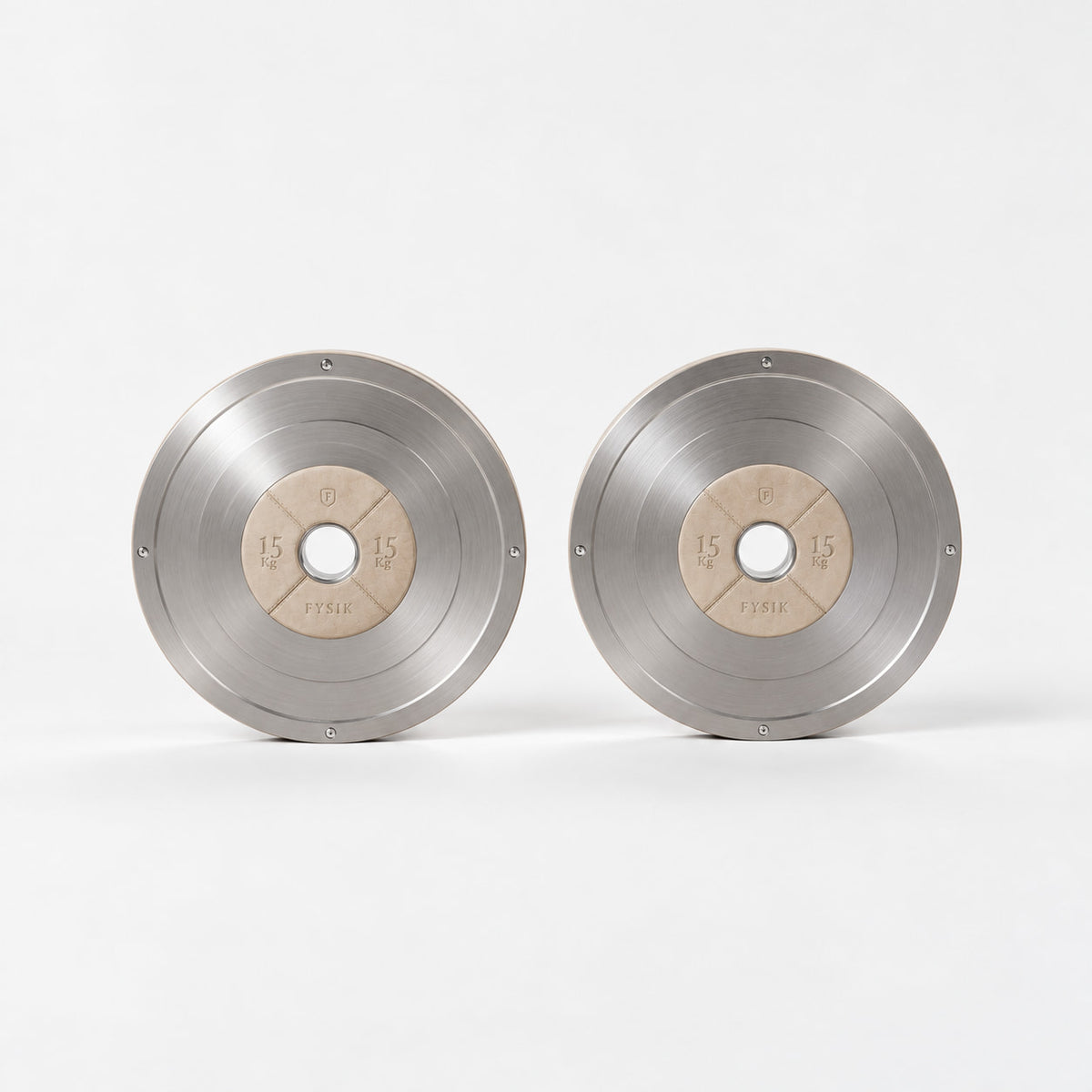 Klom Weight Plates Pair — front view; Grey Ash wood, beige leather and natural stainless steel where applicable. FYSIK studio finish study — October 2026. Representative configuration.