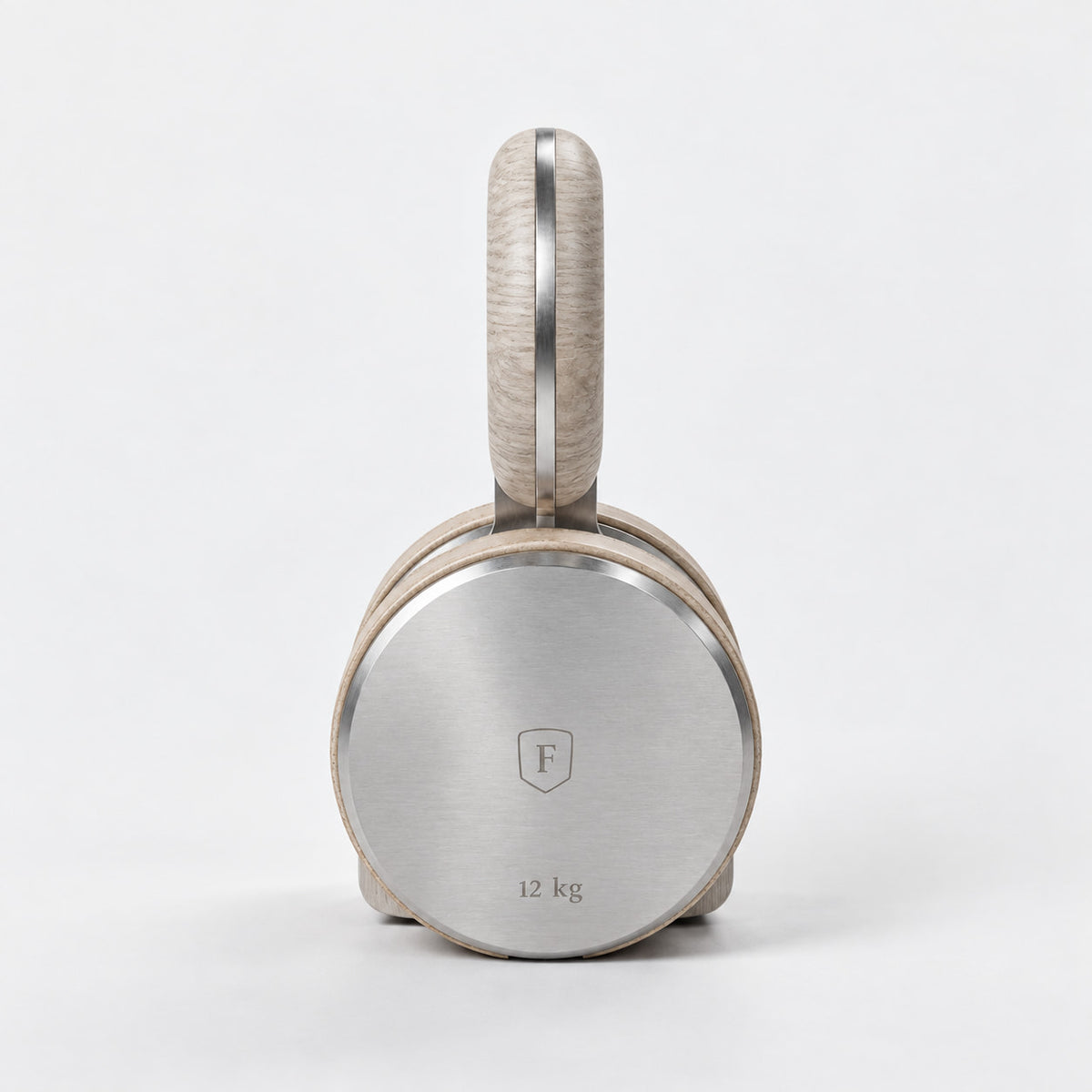 Kraba Individual Kettlebell — front view; Grey Ash wood, beige leather and natural stainless steel where applicable. FYSIK studio finish study — October 2026. Representative configuration.