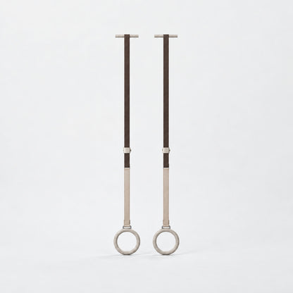 Waen Gymnastics Rings — front view; Grey Ash wood, beige leather and natural stainless steel where applicable. FYSIK studio finish study — October 2026. Representative configuration.